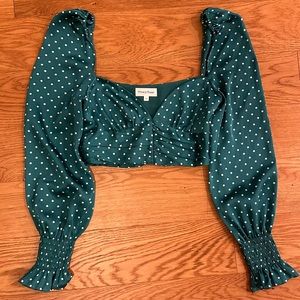 Adorable polka dot top from revolve. Puff sleeve and turquoise color.